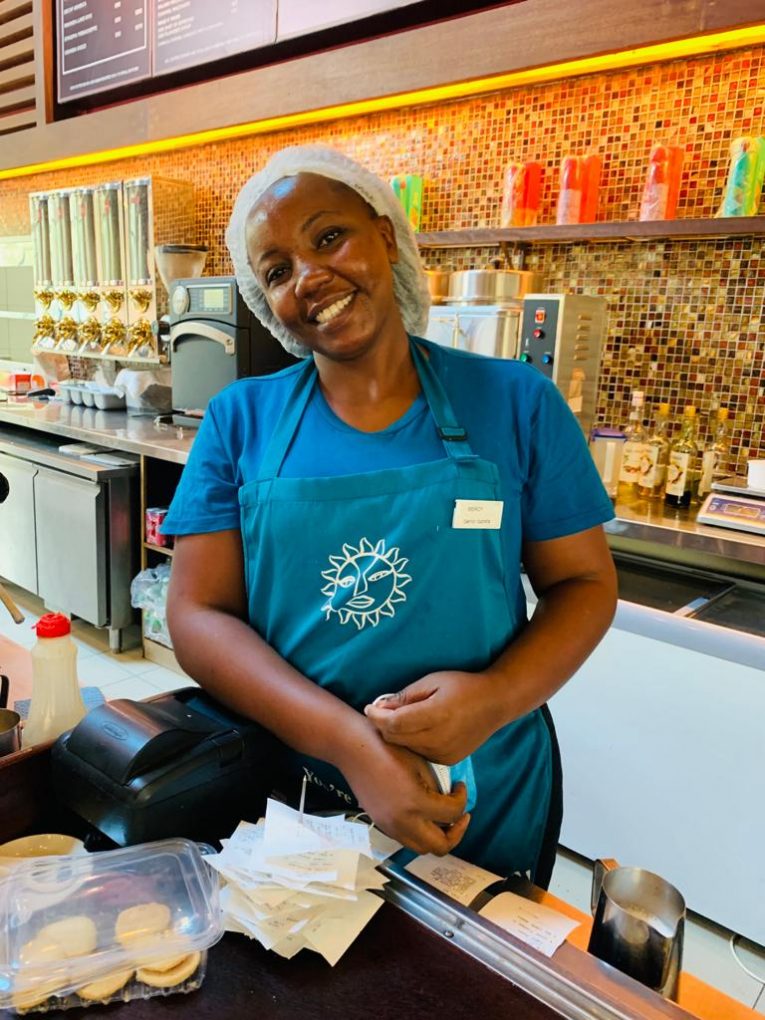 Mercy Odweso | Java house staff all smiles serving cookies